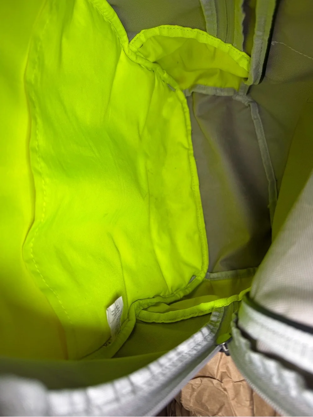 Nike Light Gray Backpack with Bright Orange Logo and Neon Accents